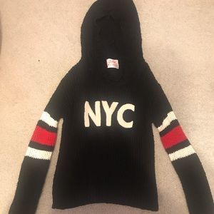 NYC Justice sweater size 10 black, red, and white